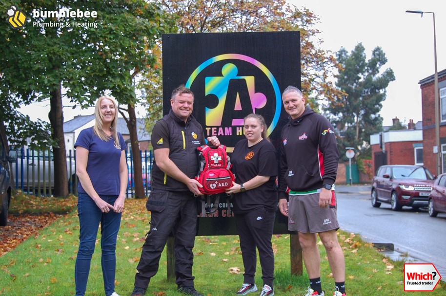 Director Ross Coen Handing Over Defib